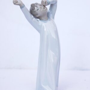 Lladro figure, boy waking up and yawning, 1980's model #4870